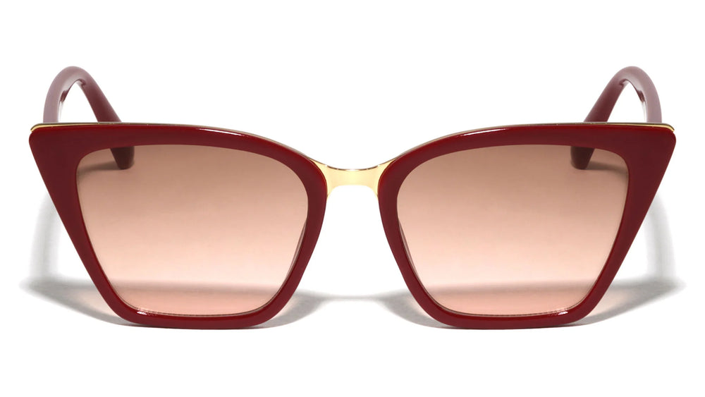 Cat eye sunglasses with a burgundy frame and gradient lenses